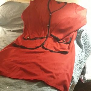 Red knit skirt suit with black trim